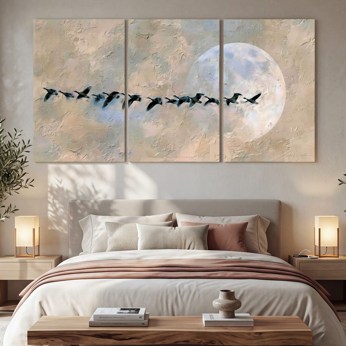 Geese flying across the moon painting 3 piece canvas wall art in a bedroom above the bed