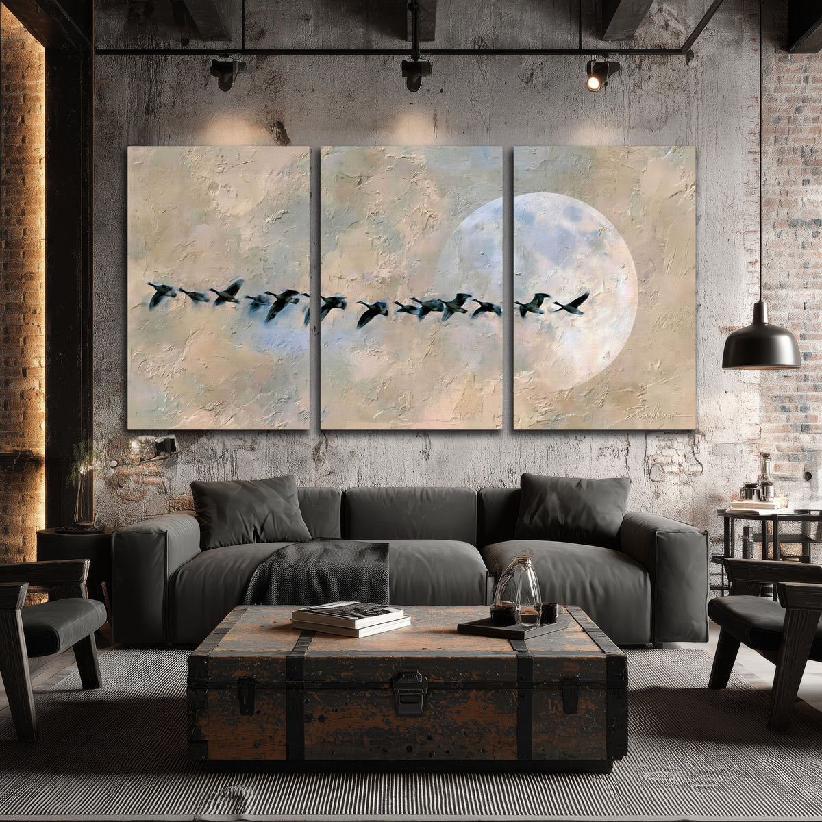 Geese flying across the moon painting 3 piece canvas wall art in an industrial loft