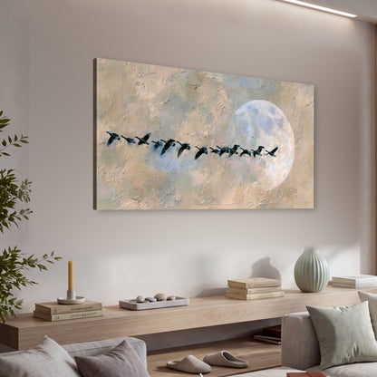 Geese flying across the moon painting canvas wall art in a living room above a console