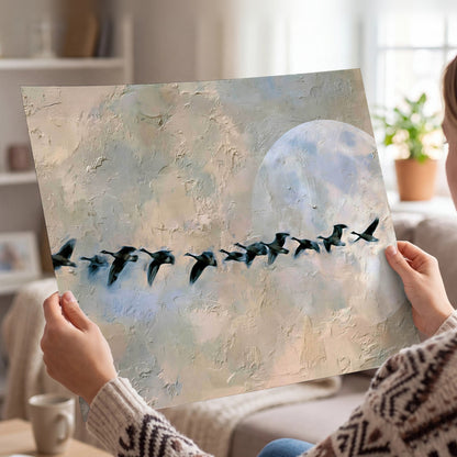 Geese flying across the moon painting poster print held in hands
