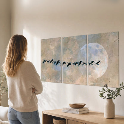 Geese flying across the moon painting set of 3 poster prints in a living room