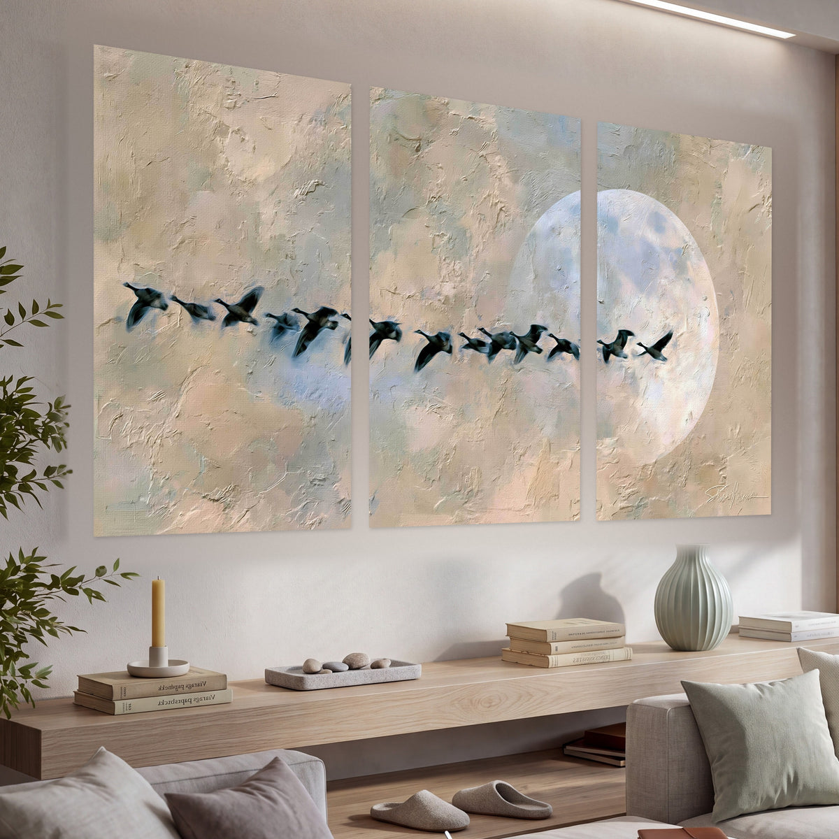 Geese flying across the moon painting set of 3 poster prints in a living room above a console