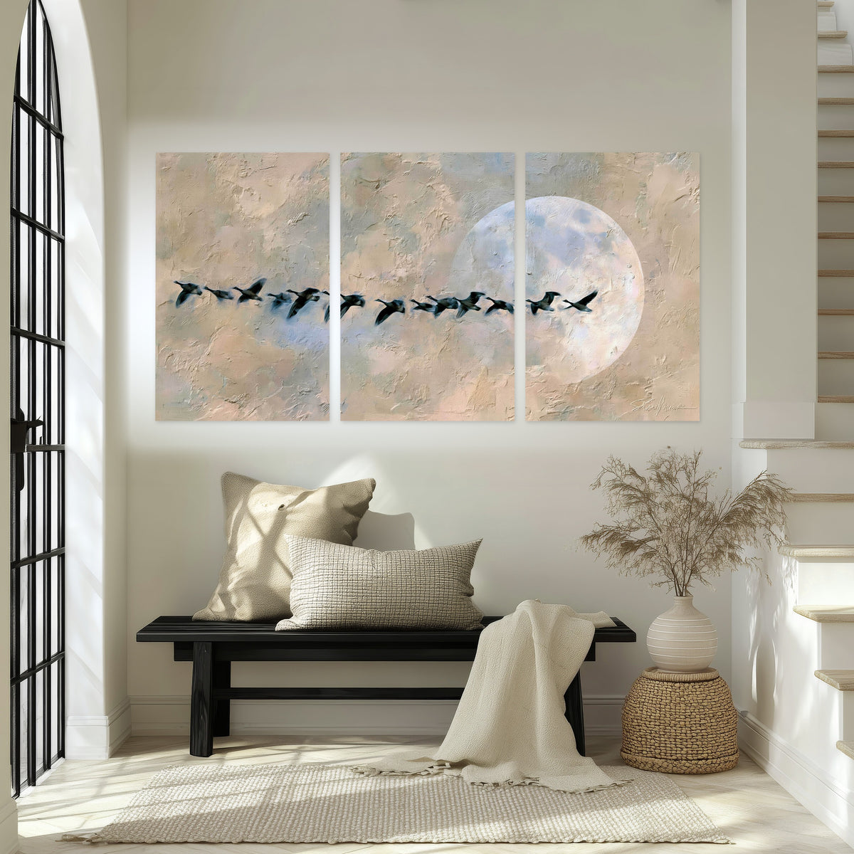 Geese flying across the moon painting set of 3 poster prints in an entryway above a bench
