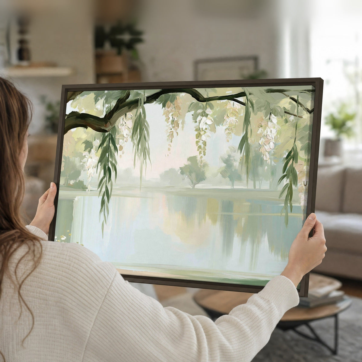 Willow tree by the lake painting framed canvas held in hands