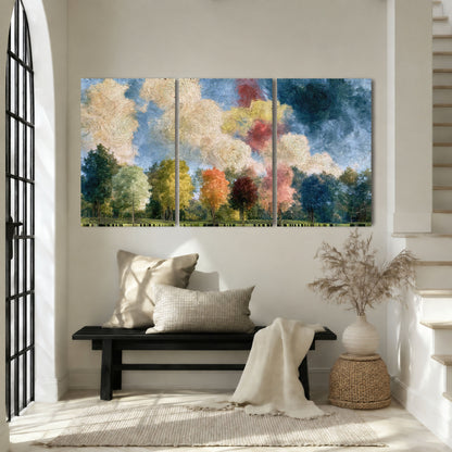 Swirling sky tree painting 3 piece canvas wall art in an entryway above a bench