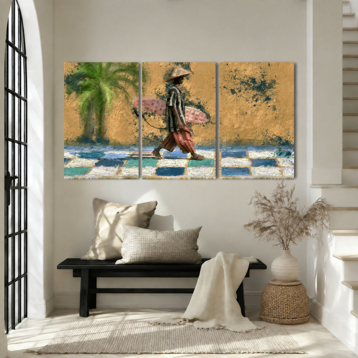 Surfer street painting 3 piece canvas wall art in an entryway above a bench