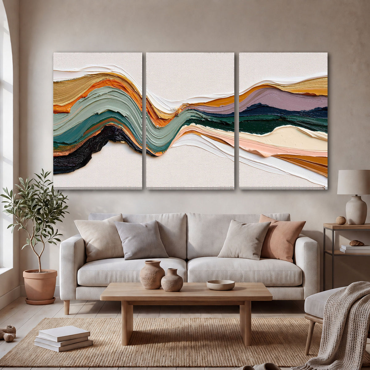 Textured abstract waves painting 3 piece canvas wall art in a bright living room