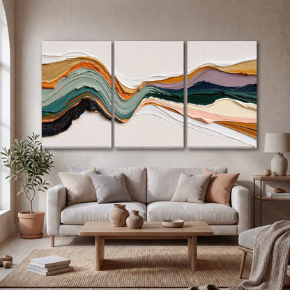 Textured abstract waves painting 3 piece canvas wall art in a bright living room