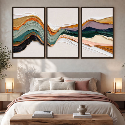 Textured abstract waves painting 3 piece framed canvas in a bedroom above the bed