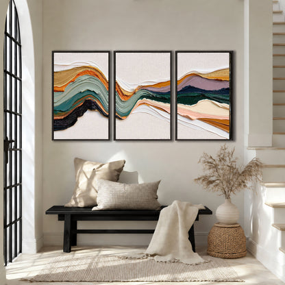 Textured abstract waves painting 3 piece framed canvas in an entryway above a bench
