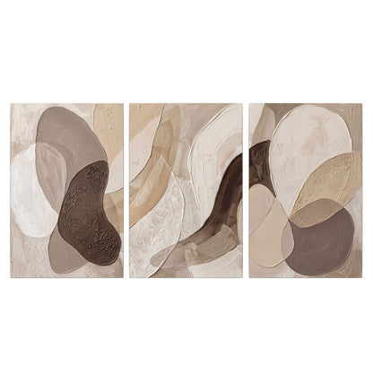 Layered organic shapes in taupe, cream and brown 3 piece canvas wall art viewed straight on