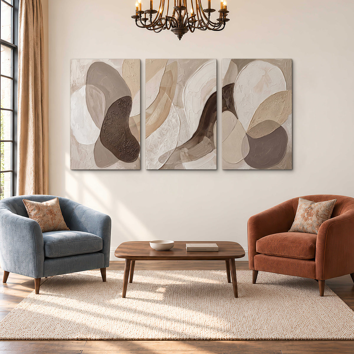 Layered organic shapes in taupe, cream and brown 3 piece canvas wall art styled in an interior