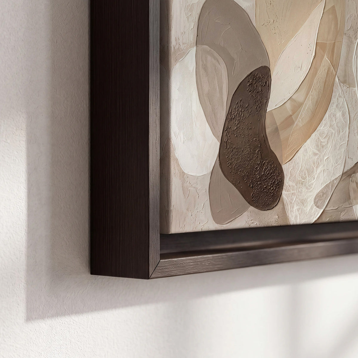 Layered organic shapes in taupe, cream and brown 3 piece framed canvas wall art material and edge close up