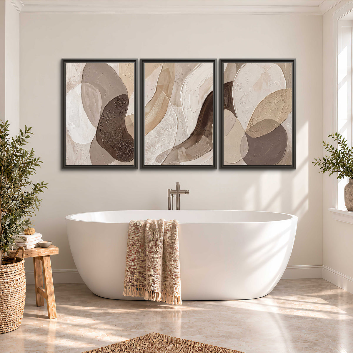 Layered organic shapes in taupe, cream and brown 3 piece framed canvas wall art styled in an interior