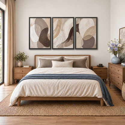 Layered organic shapes in taupe, cream and brown 3 piece framed canvas wall art styled in an interior