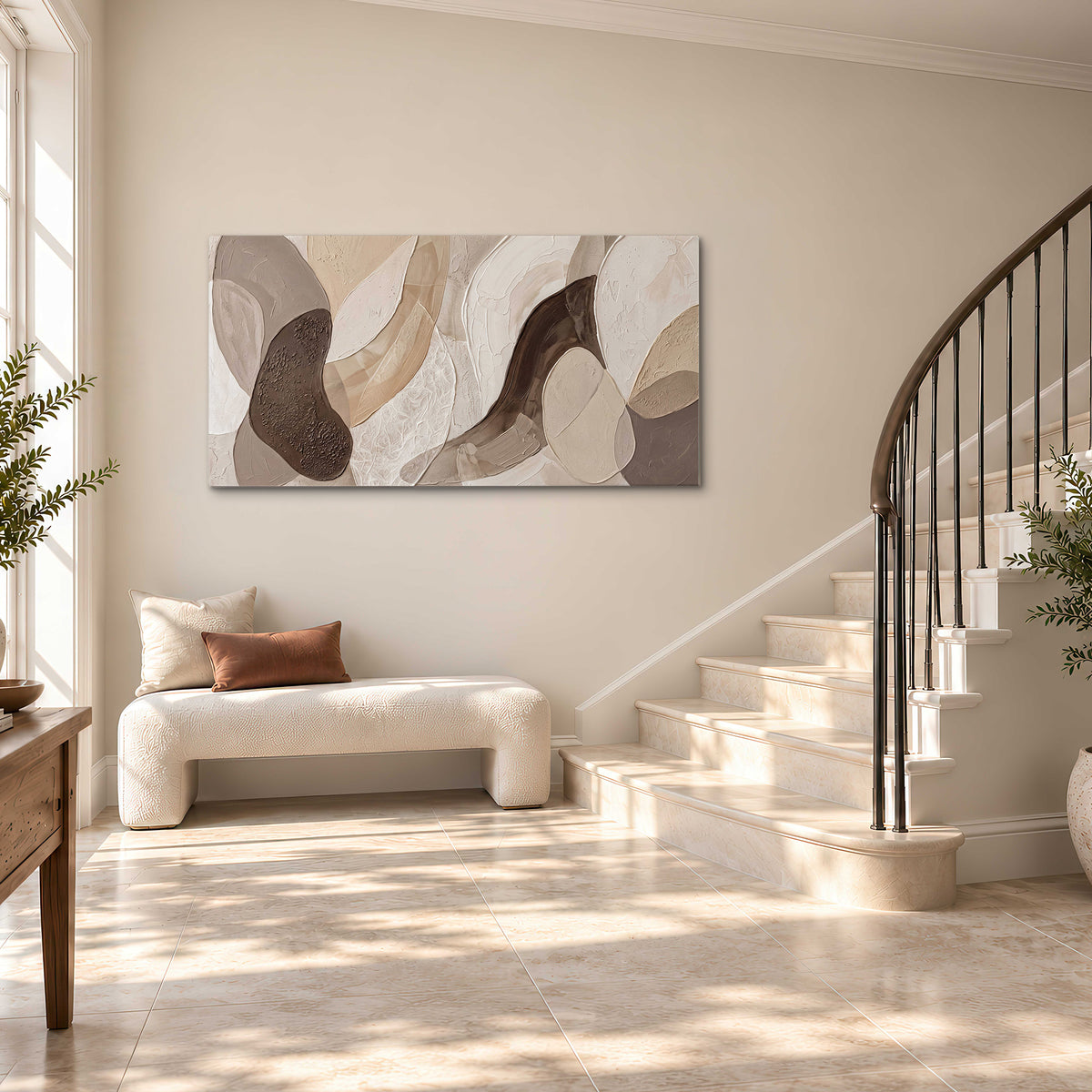 Layered organic shapes in taupe, cream and brown single canvas wall art styled in an interior