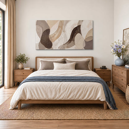 Layered organic shapes in taupe, cream and brown single canvas wall art styled in an interior