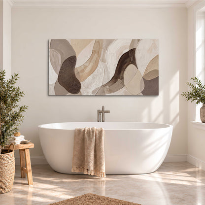 Layered organic shapes in taupe, cream and brown single canvas wall art styled in an interior