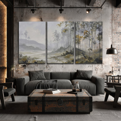 Misty woodland stream with gray trees, muted olive foliage and distant hazy hills 3 piece canvas wall art displayed in a industrial room
