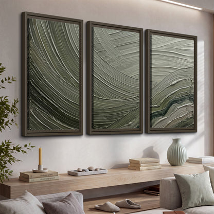 Olive and sage green abstract flowing waves with curved painted-style ridges 3 piece framed canvas wall art displayed in a console