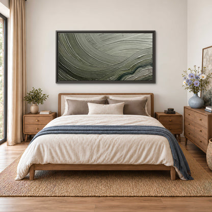 Olive and sage green abstract flowing waves with curved painted-style ridges single framed canvas wall art styled in an interior