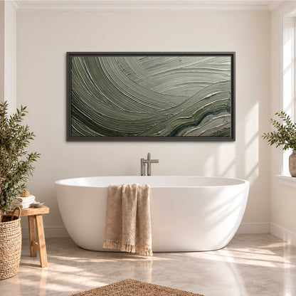 Olive and sage green abstract flowing waves with curved painted-style ridges single framed canvas wall art styled in an interior