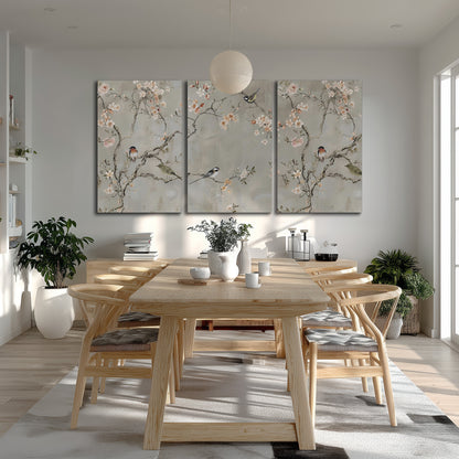 Small songbirds among pink and cream blossoms, green leaves and delicate branches on gray 3 piece canvas wall art room and product view