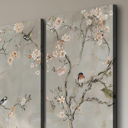 Small songbirds among pink and cream blossoms, green leaves and delicate branches on gray 3 piece canvas wall art room and product view