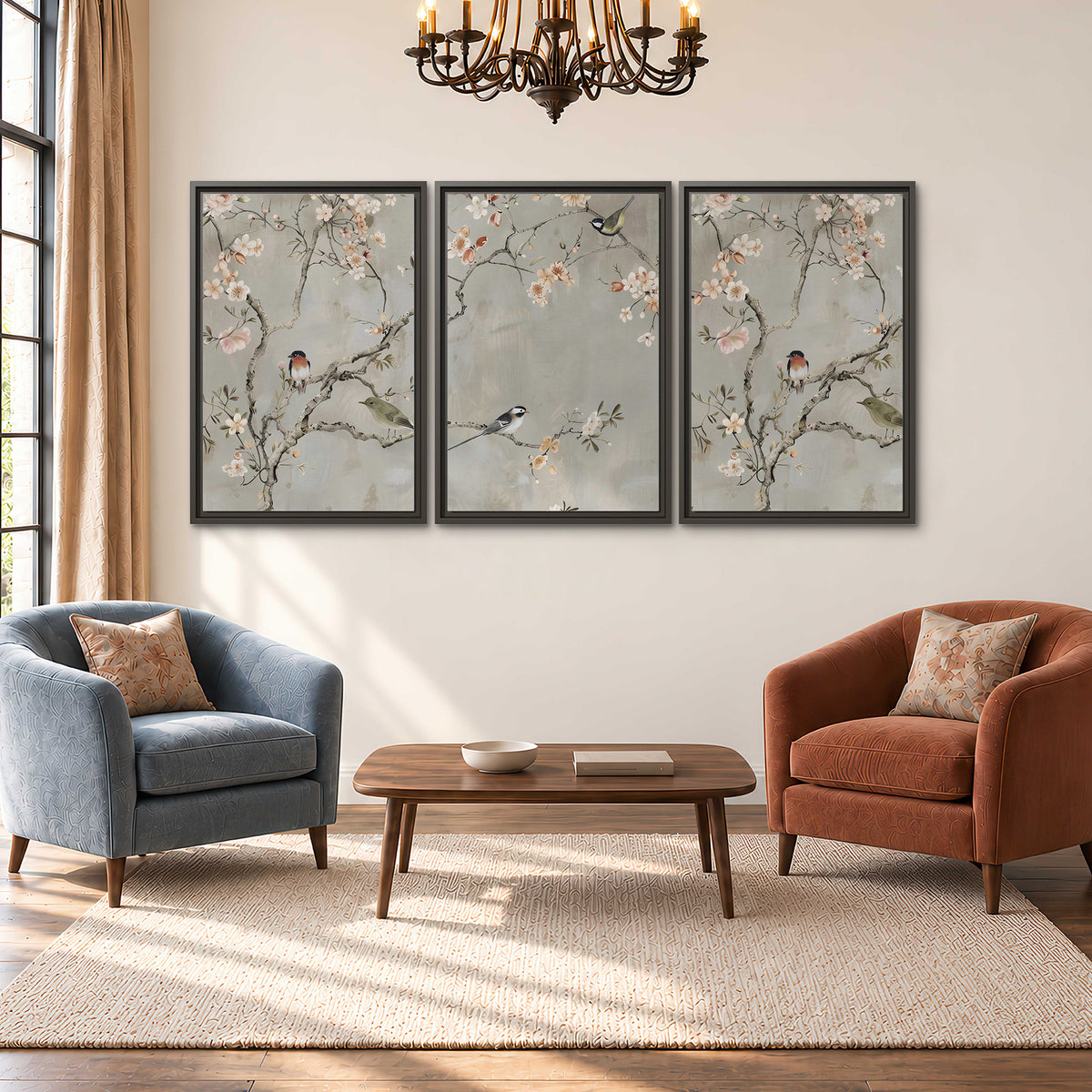 Small songbirds among pink and cream blossoms, green leaves and delicate branches on gray 3 piece framed canvas wall art styled in an interior