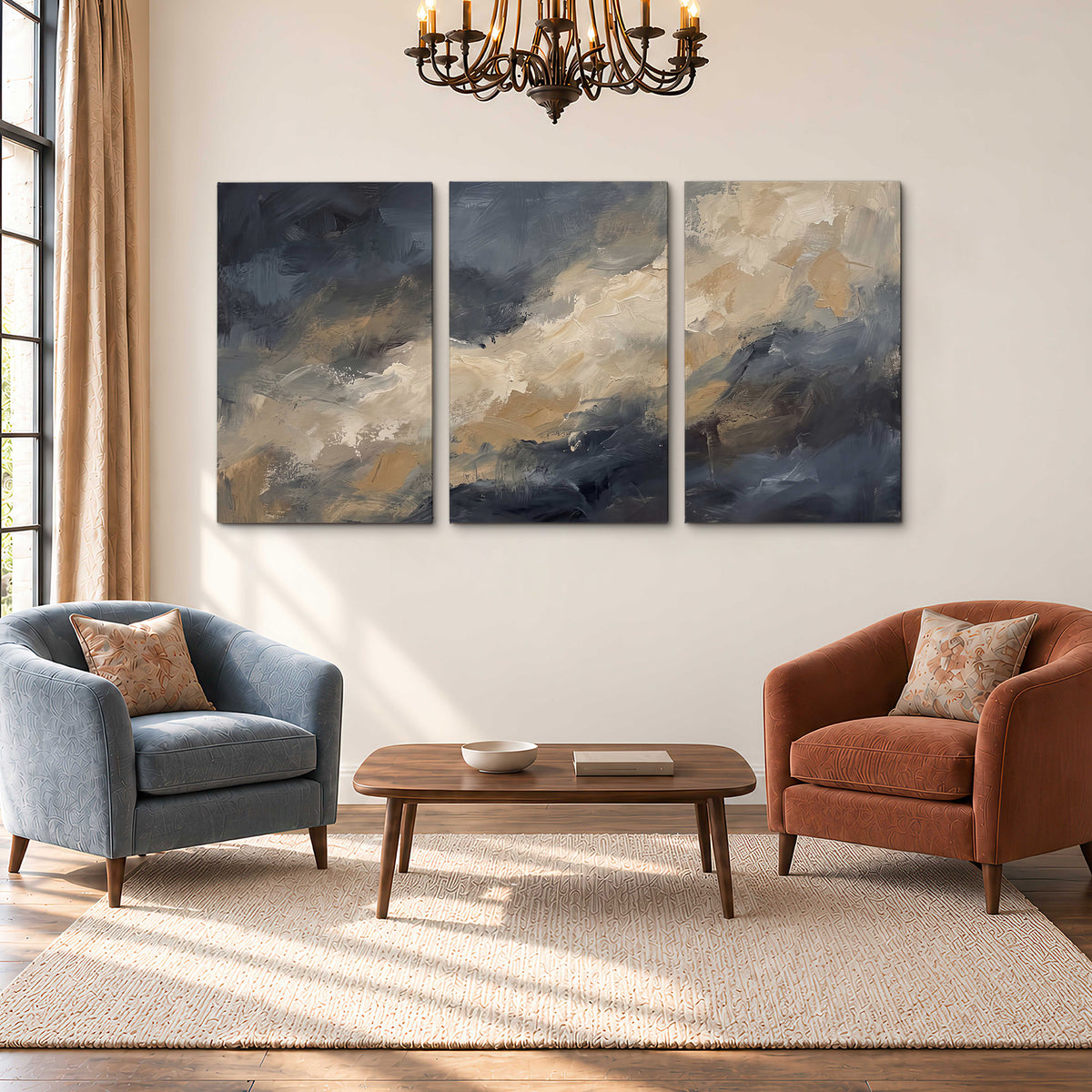Sweeping charcoal and cream painted clouds with warm gold tones 3 piece canvas wall art styled in an interior