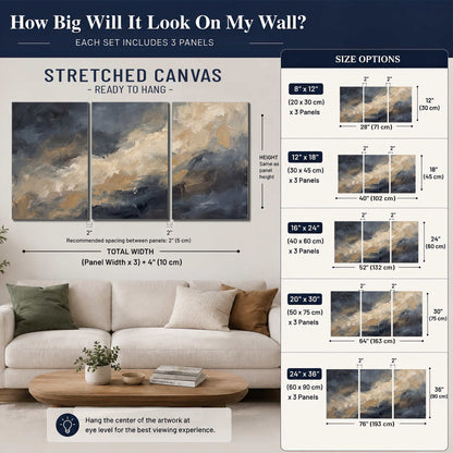 Sweeping charcoal and cream painted clouds with warm gold tones 3 piece canvas wall art size guide above a sofa; room view is illustrative
