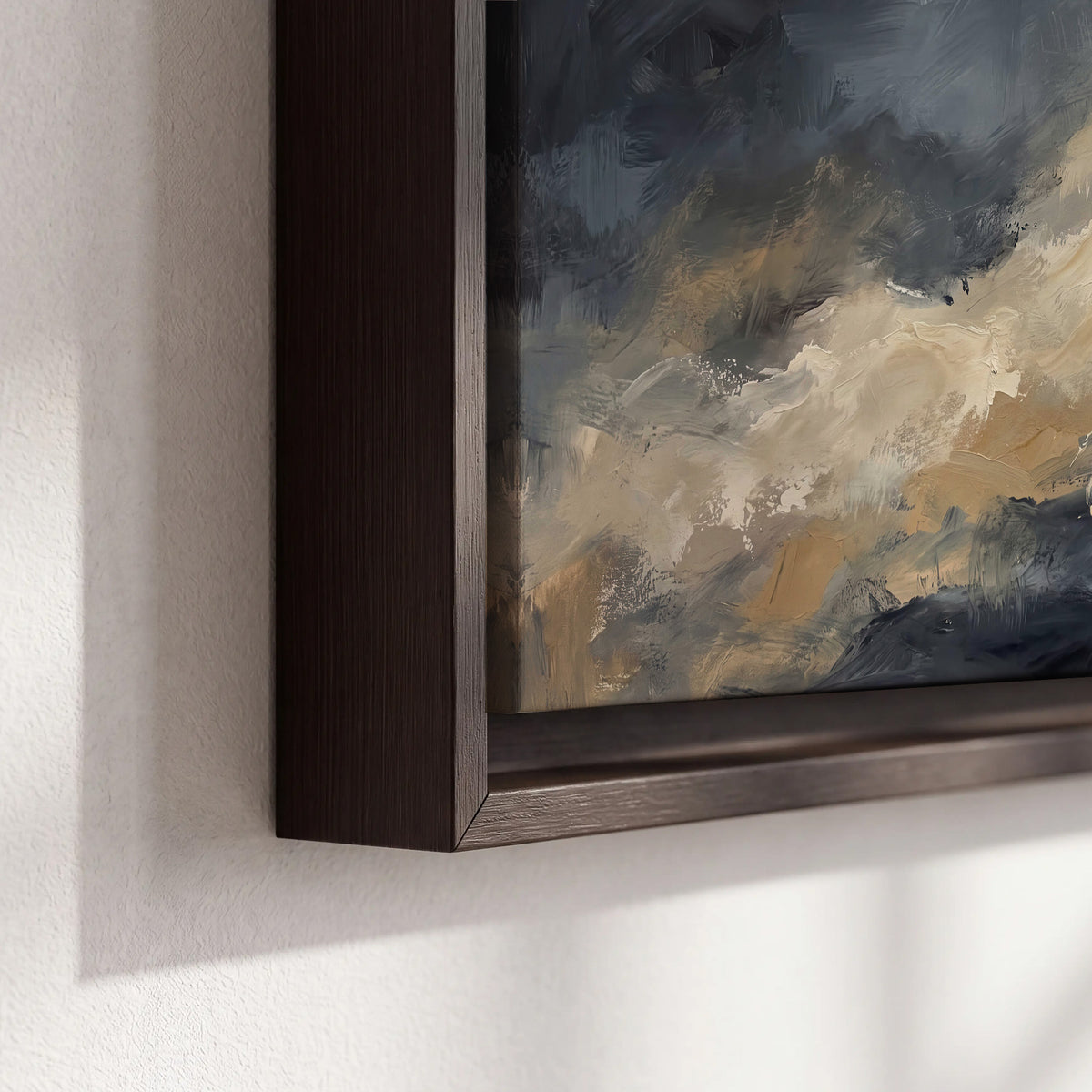 Sweeping charcoal and cream painted clouds with warm gold tones 3 piece framed canvas wall art material and edge close up