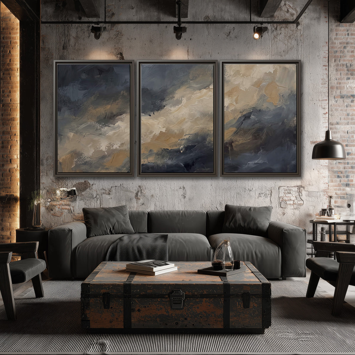 Sweeping charcoal and cream painted clouds with warm gold tones 3 piece framed canvas wall art displayed in a industrial room