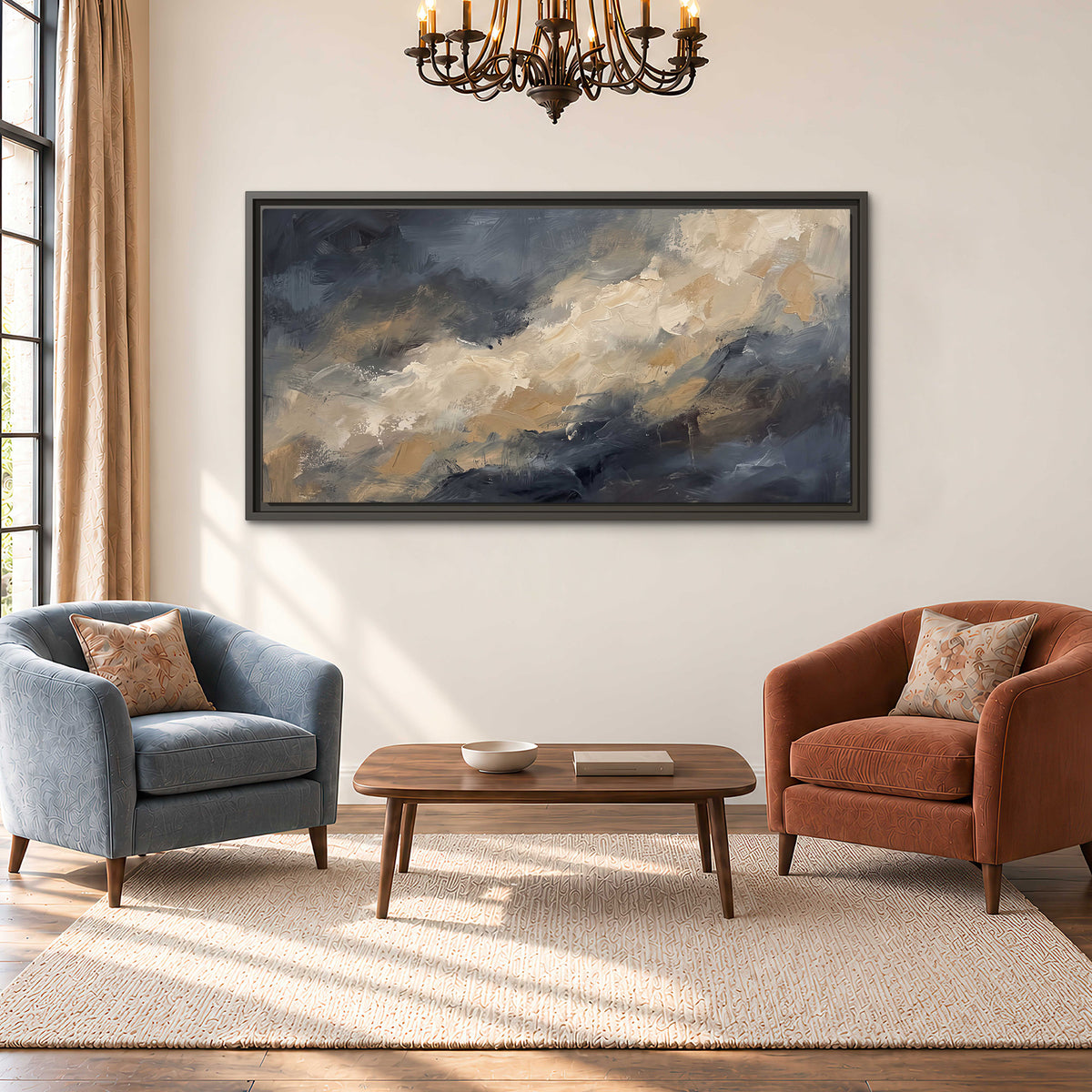 Sweeping charcoal and cream painted clouds with warm gold tones single framed canvas wall art styled in an interior