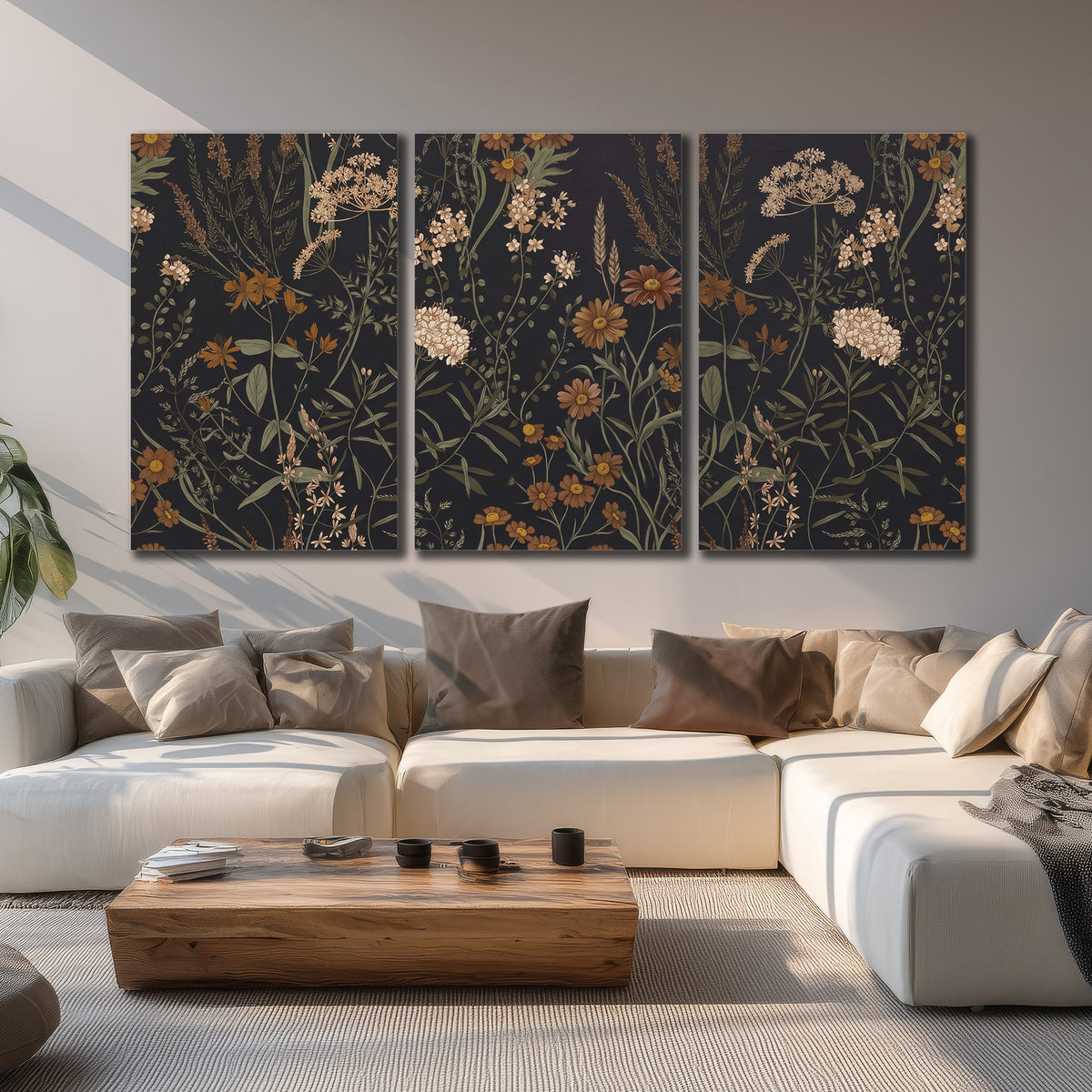 Small cream and rust flowers on a dark botanical background 3 piece canvas wall art displayed in a living room