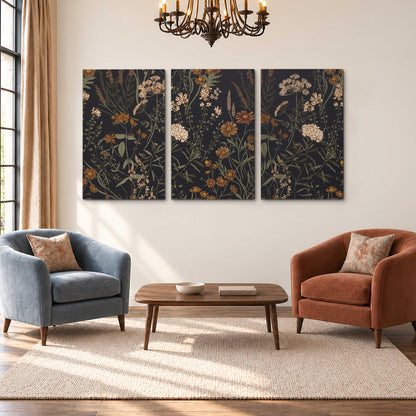 Small cream and rust flowers on a dark botanical background 3 piece canvas wall art styled in an interior