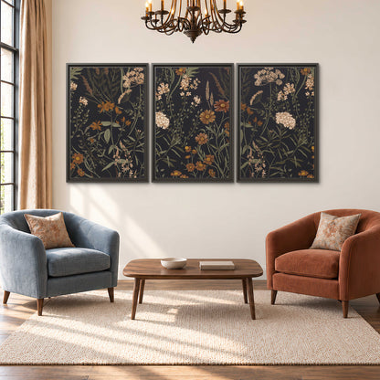 Small cream and rust flowers on a dark botanical background 3 piece framed canvas wall art styled in an interior