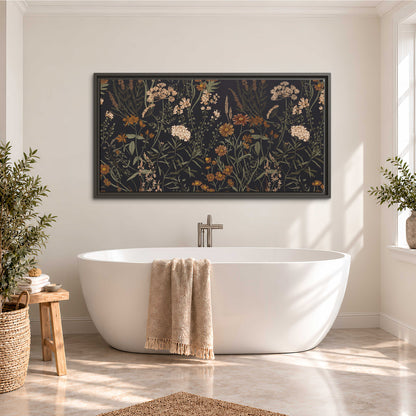 Small cream and rust flowers on a dark botanical background single framed canvas wall art styled in an interior