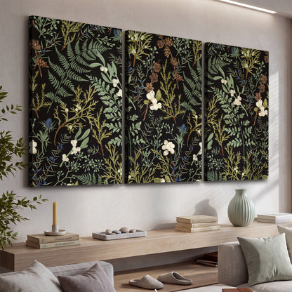 Fine green ferns and cream flowers on a black background 3 piece canvas wall art displayed in a console