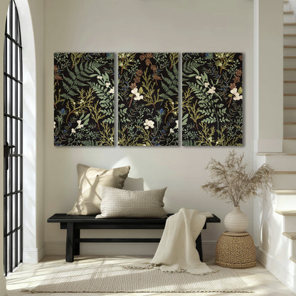 Fine green ferns and cream flowers on a black background 3 piece canvas wall art displayed in a entryway