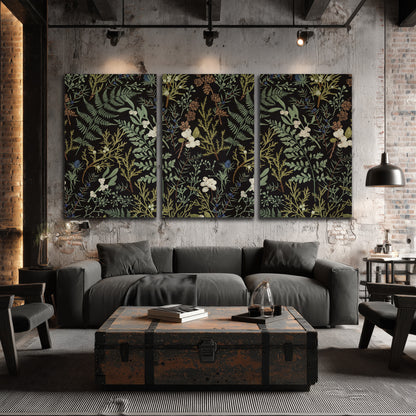 Fine green ferns and cream flowers on a black background 3 piece canvas wall art displayed in a industrial room