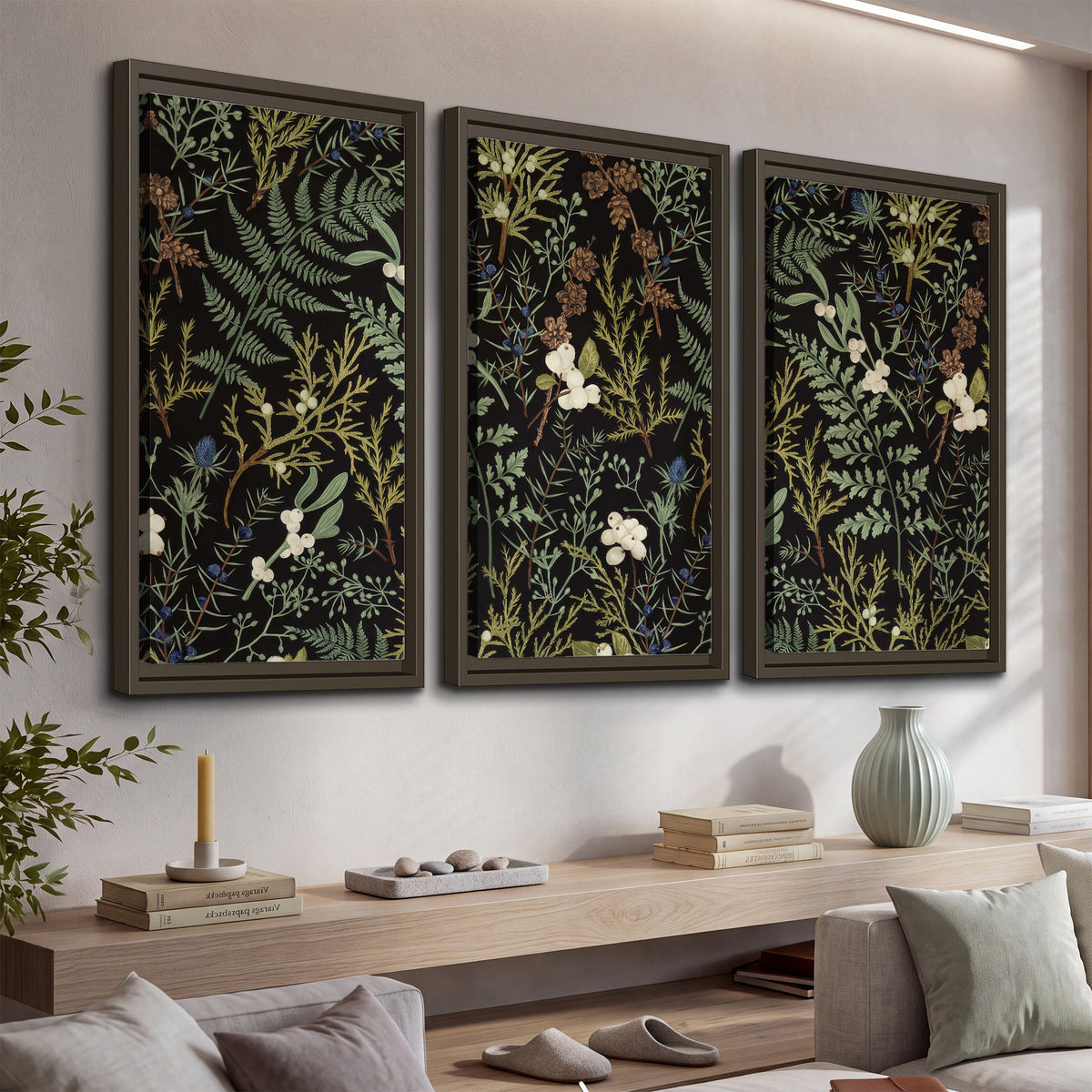 Fine green ferns and cream flowers on a black background 3 piece framed canvas wall art displayed in a console