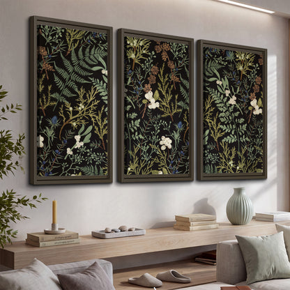 Fine green ferns and cream flowers on a black background 3 piece framed canvas wall art displayed in a console