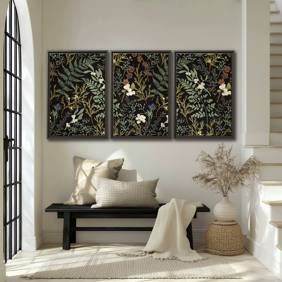 Fine green ferns and cream flowers on a black background 3 piece framed canvas wall art displayed in a entryway