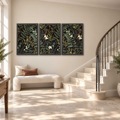 Fine green ferns and cream flowers on a black background 3 piece framed canvas wall art styled in an interior