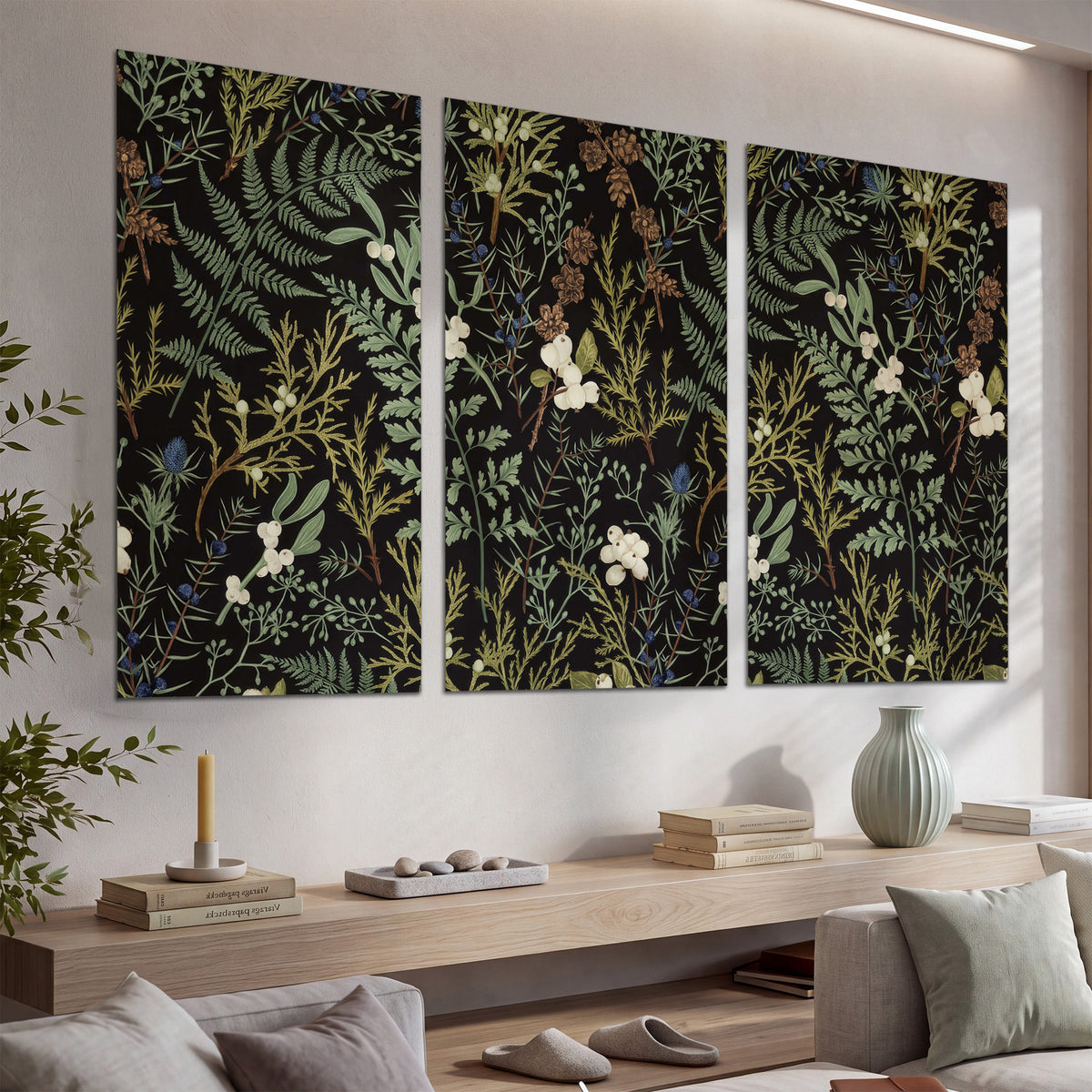 Fine green ferns and cream flowers on a black background set of 3 poster prints displayed in a console