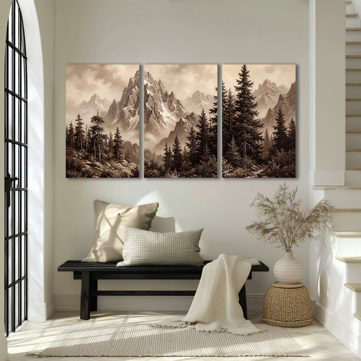 Dramatic mountain peaks framed by evergreen trees 3 piece canvas wall art displayed in a entryway