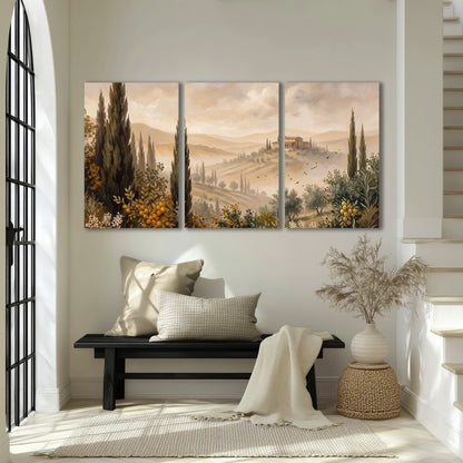 Cypress trees, distant villas and warm rolling hills 3 piece canvas wall art displayed in a entryway