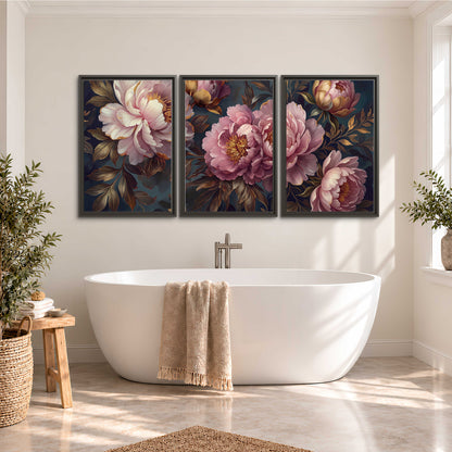Large pink and cream peonies against deep blue foliage 3 piece framed canvas wall art styled in an interior