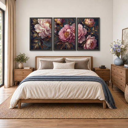 Large pink and cream peonies against deep blue foliage 3 piece framed canvas wall art styled in an interior